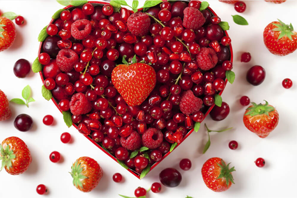 Berries in a bowl in the shape of a heart
