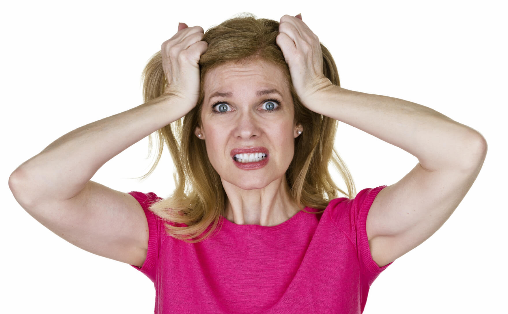 Woman pulling her hair because she is stressed