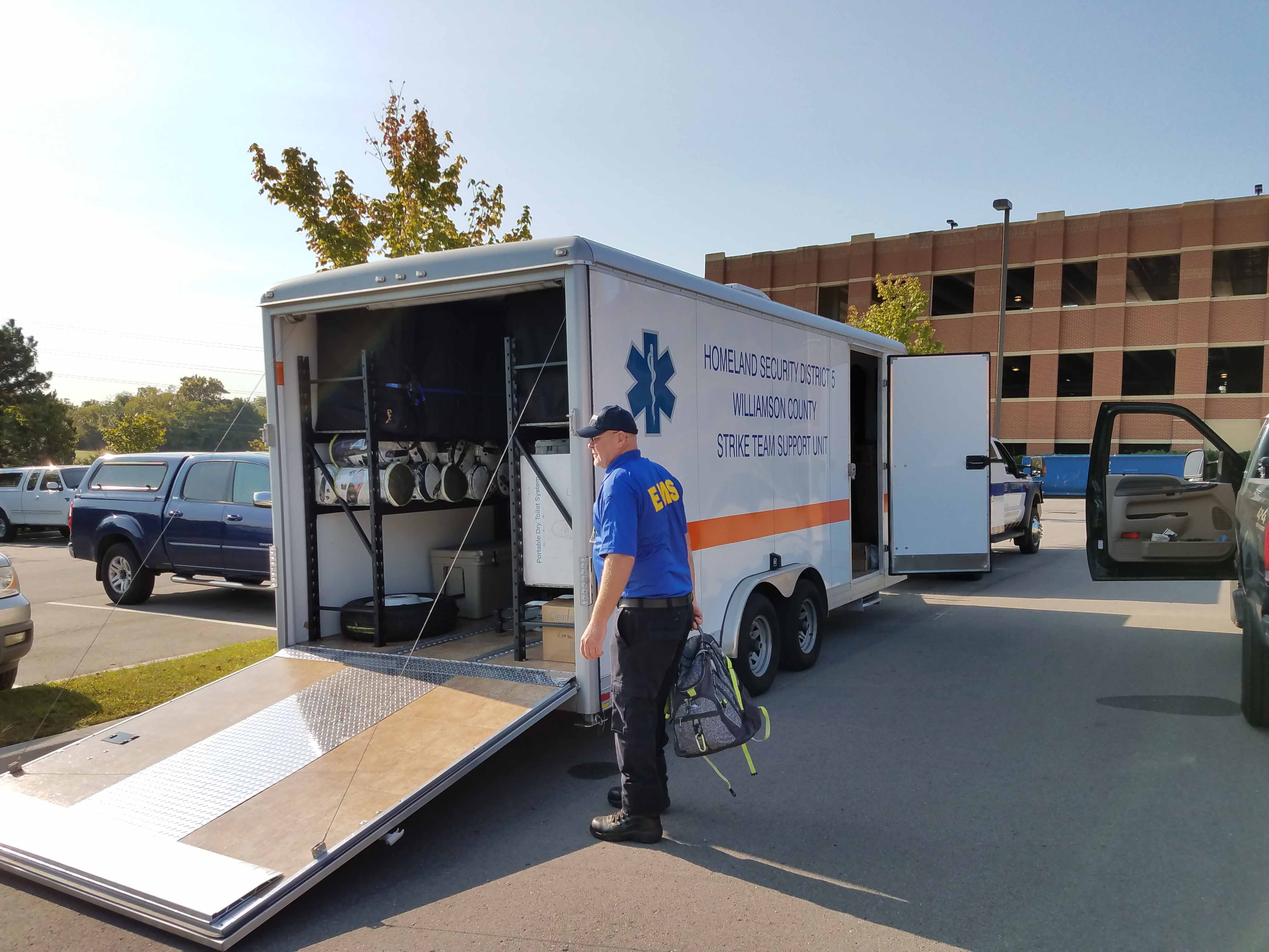 Robert Skinner, Paramedic packs a trailer that he, James Bourland, EMS Supervisor/CCPM, and Clyde Prater, EMS Supervisor/CCPM, will use when they travel to Florida to assist with the response to Hurricane Irma.