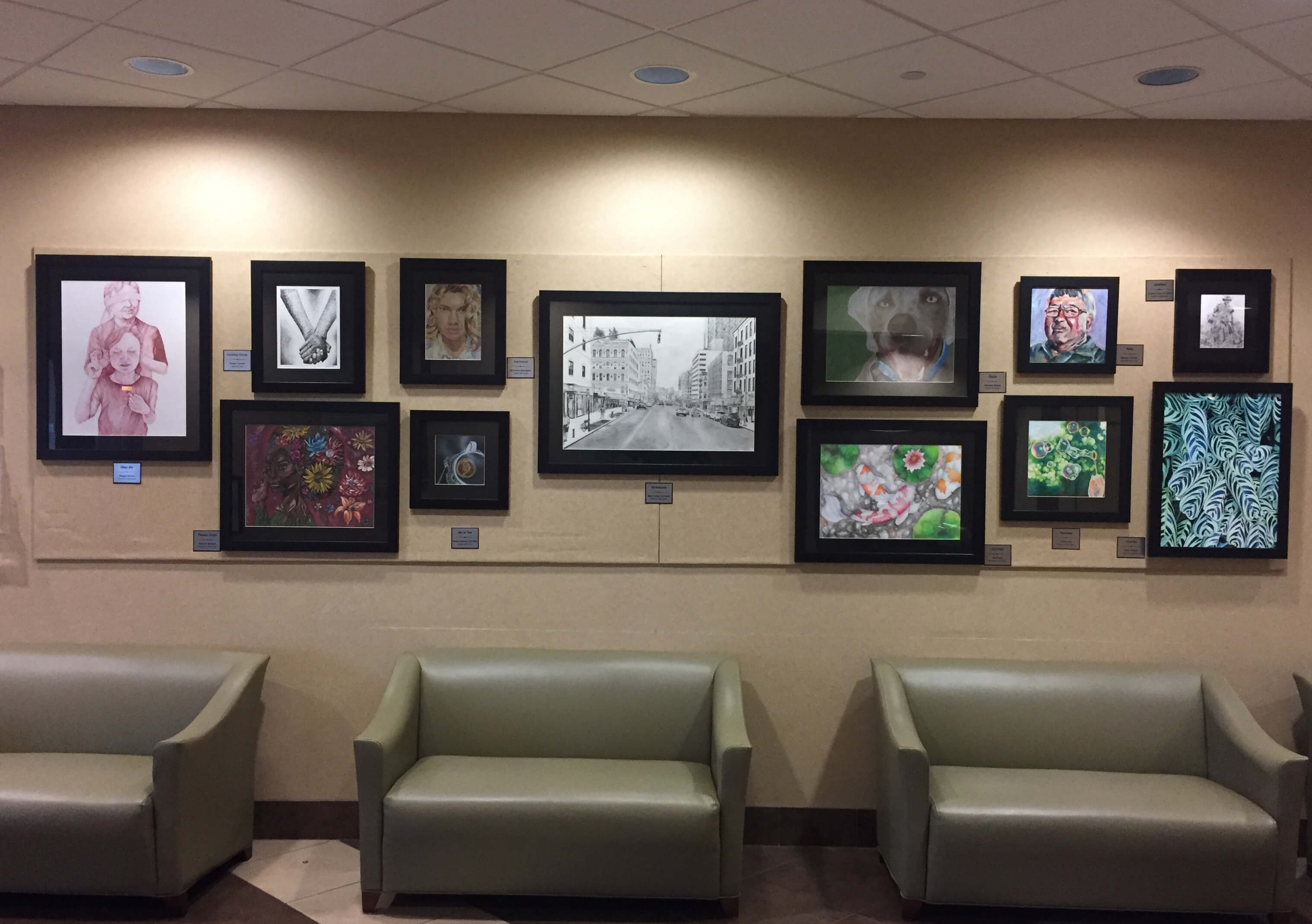 Artwork of 2018 Student Art Competition finalists, hung up for display in Williamson Tower